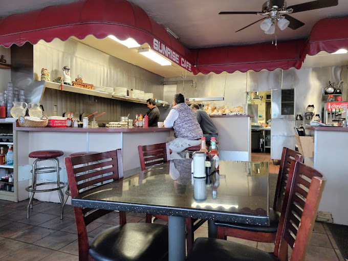 The Sunrise Cafe's counter, under the red scalloped awning